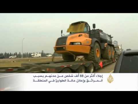 بالفيديو إقليم ألبرتا الكندي يواجه حرائق الغابات