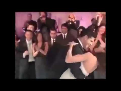 شاهد عريس وعروسة يذهلان الحضور برقصة استعراضية مشتركة