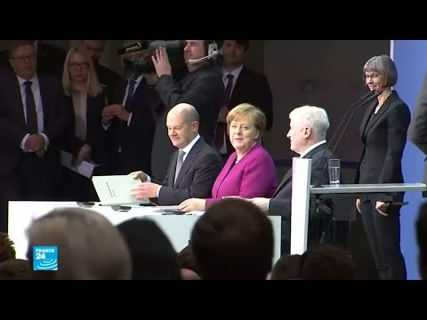 شاهد ميركل تواجه انتقادات لاذعة بعد التسوية الألمانية بشأن الهجرة