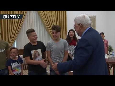 شاهد عباس يستقبل الفلسطينية المُحرّرة عهد التميمي