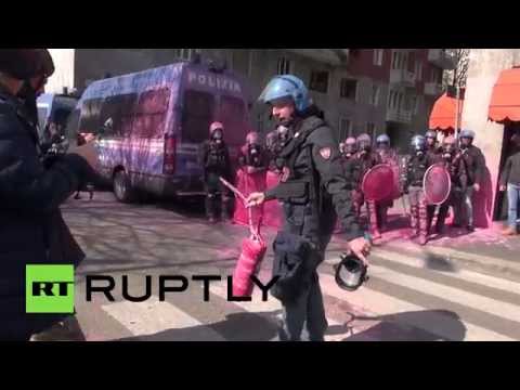 شاهد اشتباكات بين الشرطة ومحتجين في إيطاليا