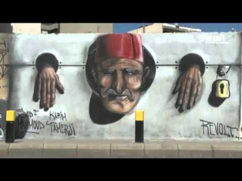 15 رسامًا يُحوِّلون جدارًا في بيروت لأكبر لوحة