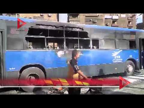 مجهولون يحرقون حافلة نقل عام في بولاق الدكرور
