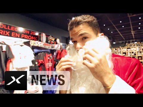 حاتم بن عرفة يرتدى ملابس بابا نويل لتهنئة المارة بالكريسماس
